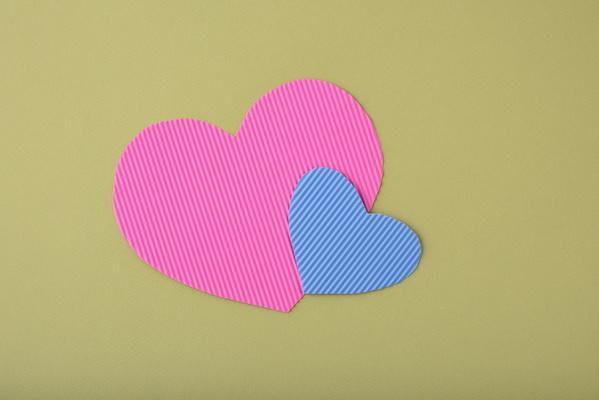 Pink and Blue Valentine Cards on Beige Background